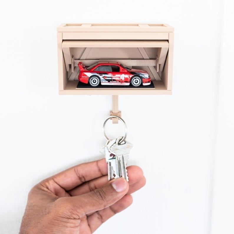 🔥Hot Sale 49% OFF🔥 🚗🔑 Auto Garage Key Holder - Interactive Opening Door